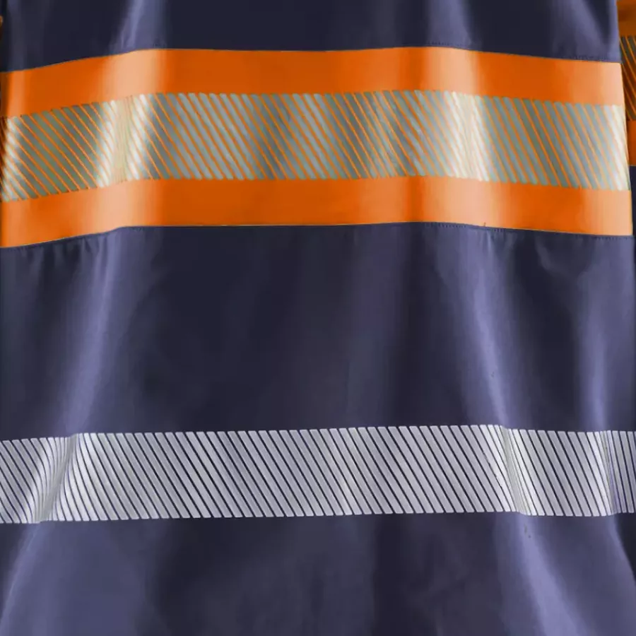 **Segmented Reflective Strips** boost visibility while keeping the jacket flexible and comfortable.