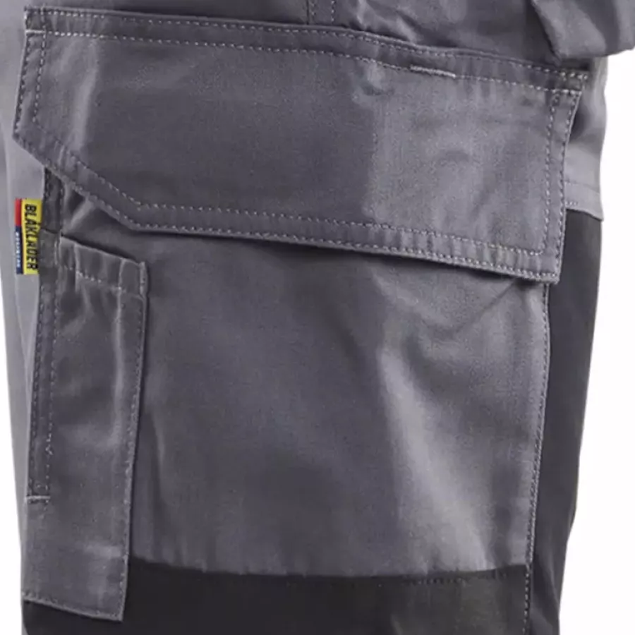**Reinforced Tool Pockets** keep your essentials secure and ready for quick access.
