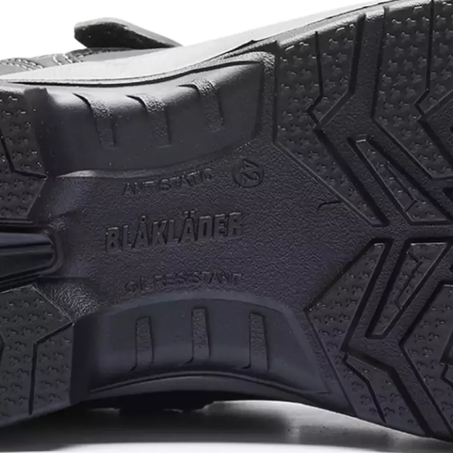 **Oil Resistant Outsole** provides reliable grip so you can move confidently on slippery surfaces.