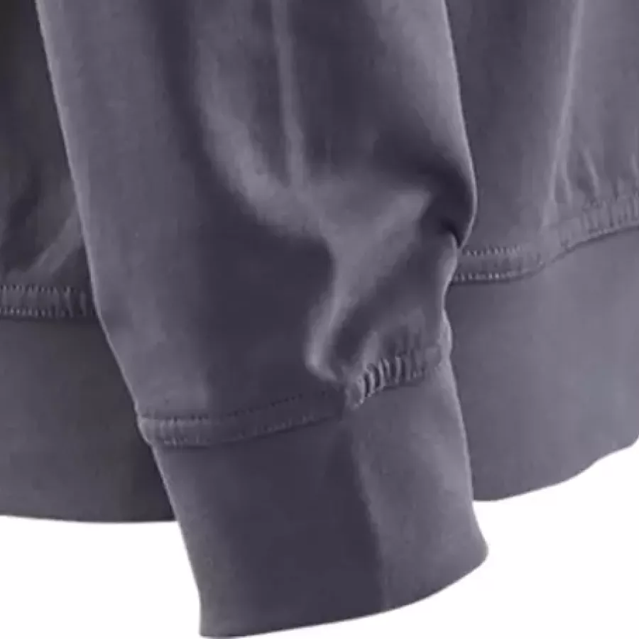 **Ribbed Cuffs** keep sleeves snug and warmth locked in without restricting comfort.