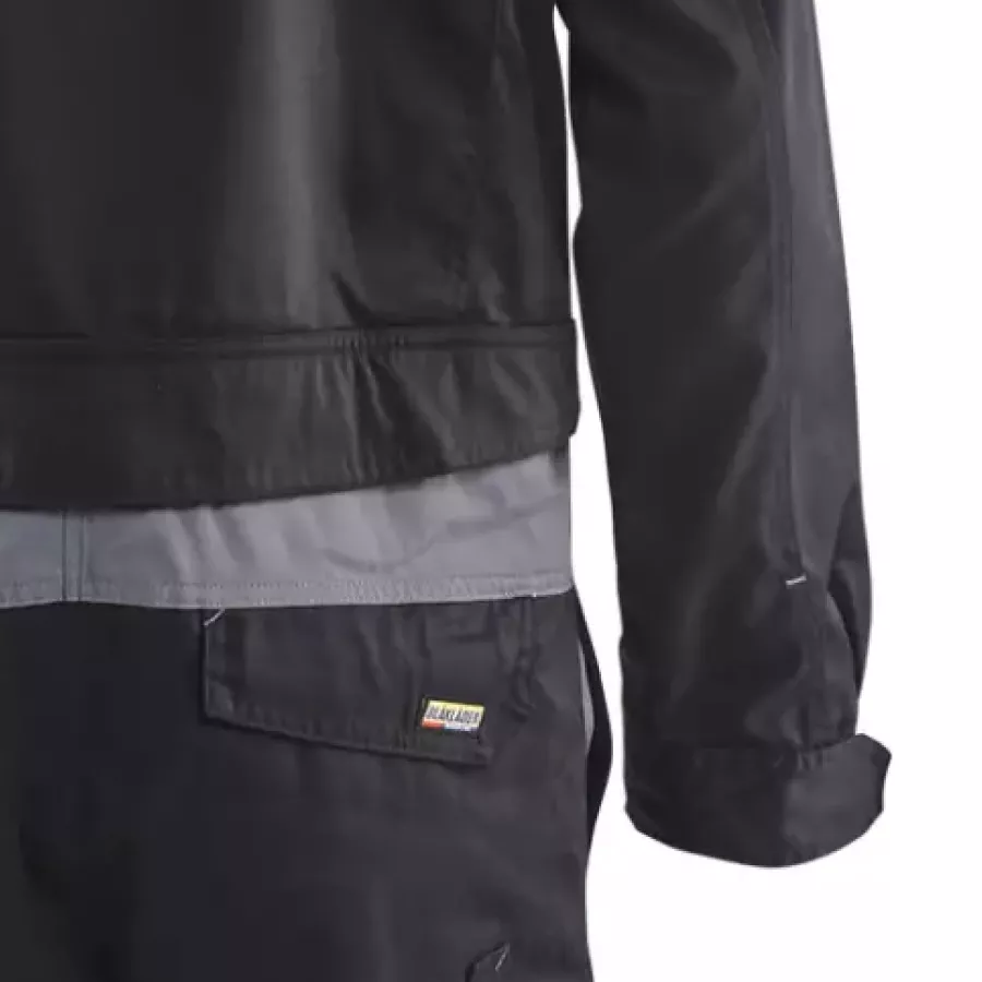 **Adjustable Cuffs and Elastic Waist** provide a comfortable, tailored fit that stays secure through any task.