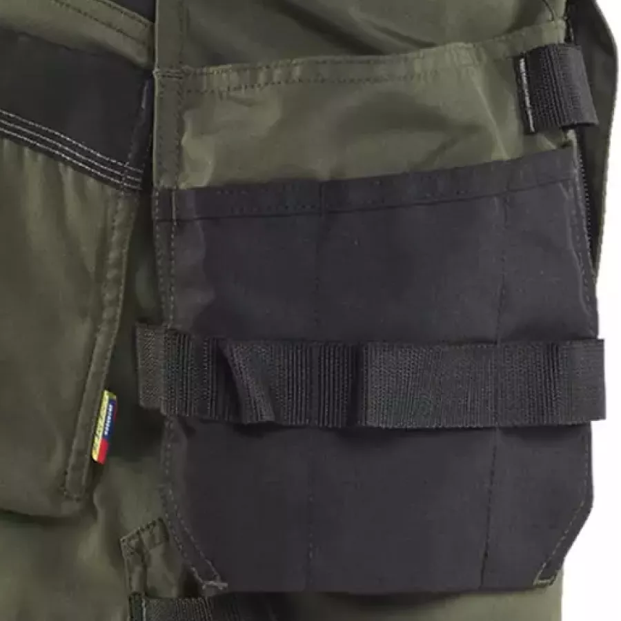 **Holster Pockets** keep your essentials close at hand so you can move freely without breaking your flow.