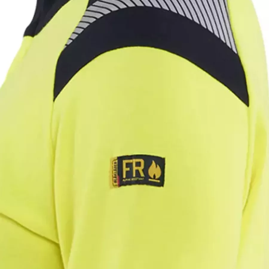 **Flammhemmendes Material** bietet zuverlässigen Schutz, der Ihnen hilft, mit ruhiger Gewissheit zu arbeiten.