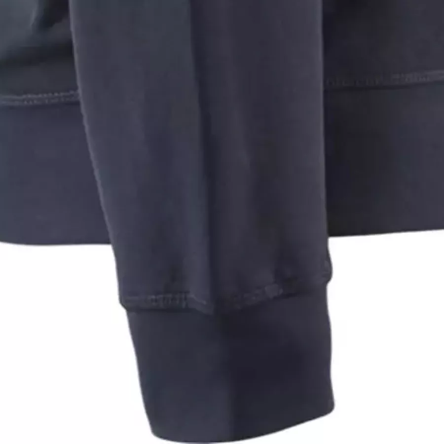 **Ribbed Cuffs** hold the sleeves in place while keeping warmth comfortably close.