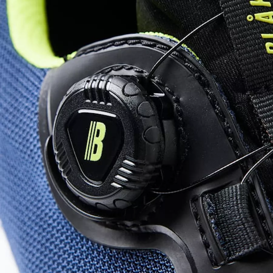 Das **Freelock-Schnürsystem** ermöglicht das blitzschnelle Einstellen eines sicheren Sitzes für mühelosen, ganztägigen Tragekomfort.