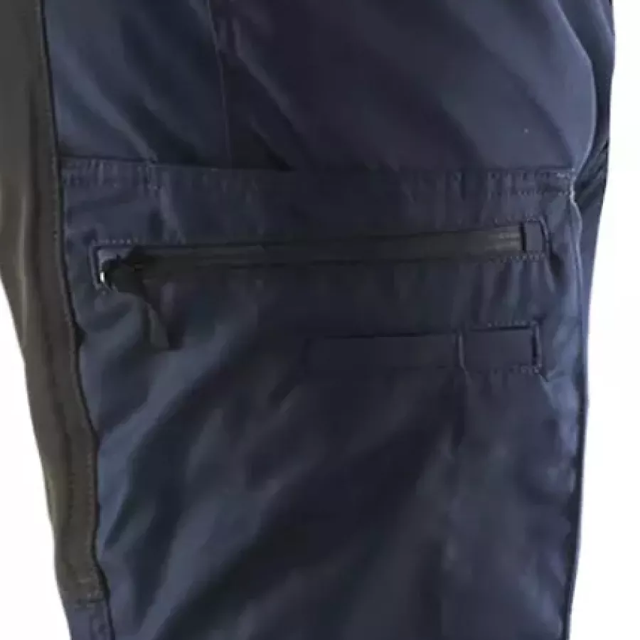 **Pen and Knife Pocket** keeps your essential tools within easy reach whenever you need them.