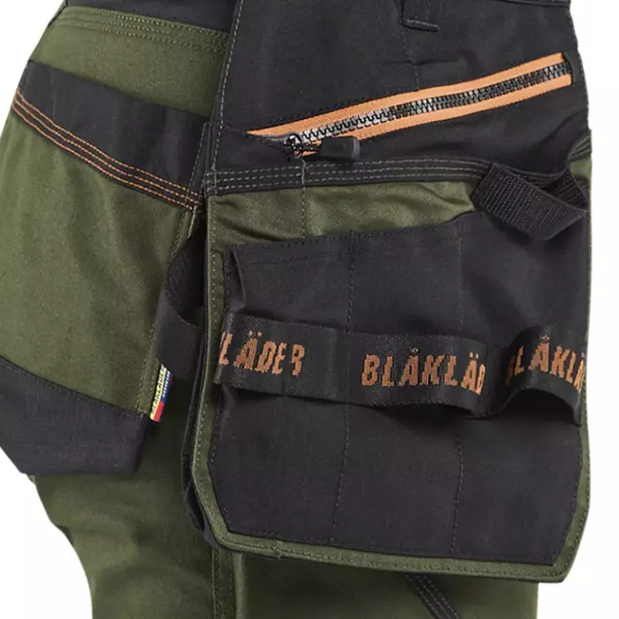 **Detachable Holster Pocket** lets you keep essential tools within reach and lighten your load whenever you want.
