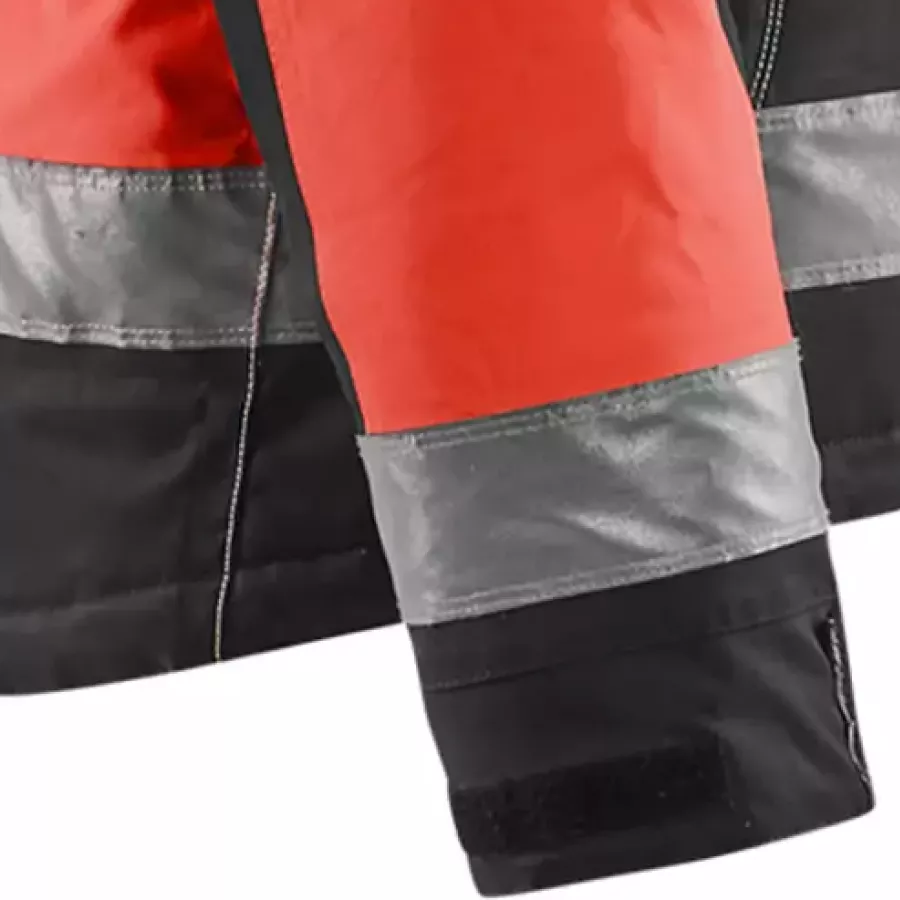 **Adjustable Velcro Cuffs** ensure a snug, customizable fit that helps keep cold air out.