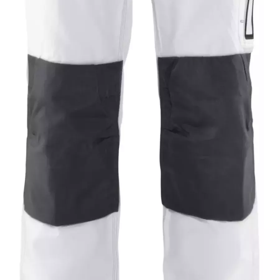 **CORDURA® Reinforced Knee Pad Pockets** give you durable, cushioned support when you work on your knees.