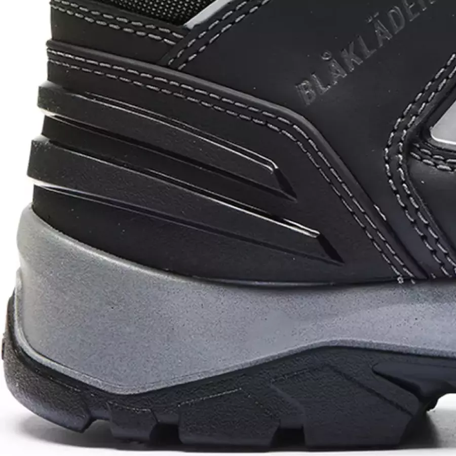 **TPU Reinforcements at the Heel** add stable support for confident movement throughout the day.