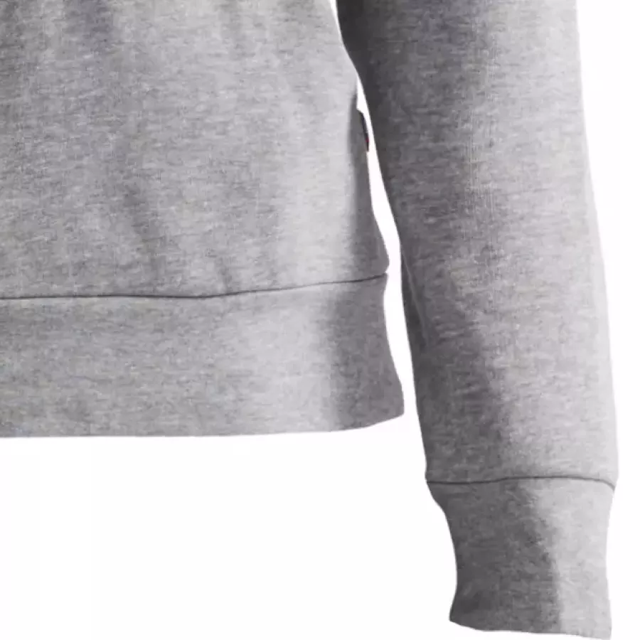 **Ribbed Cuffs** hold sleeves in place for comfort that moves with you.