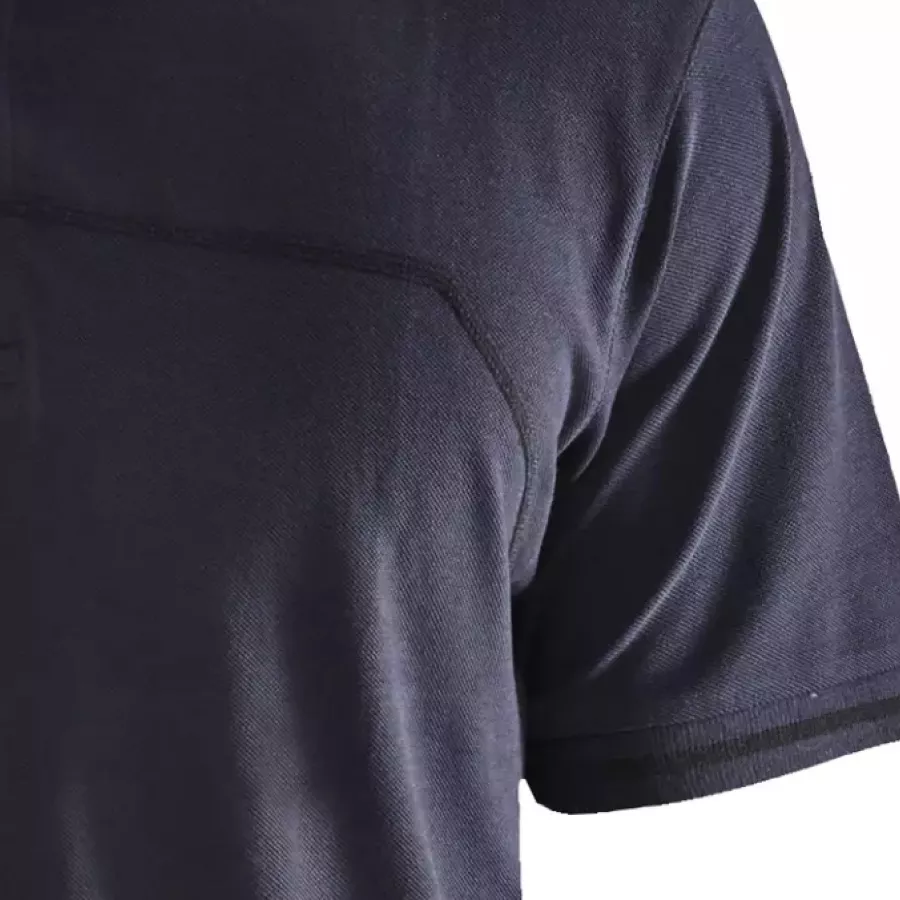 **Short Sleeves with Ribbed Cuffs** offer easy movement while maintaining a neat, structured finish.