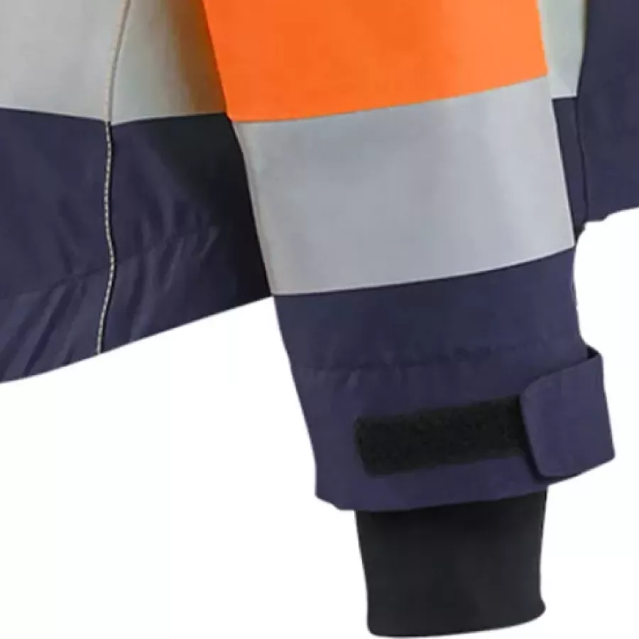 **Adjustable Velcro Cuffs with Thumb Hole** ensure a secure fit while keeping sleeves in place and offering added hand protection.