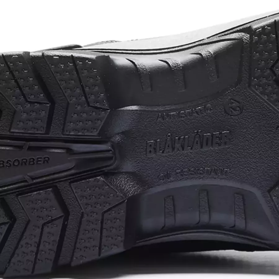 **Oil-Resistant Outsole** maintains steady traction so you can walk securely on slick surfaces.