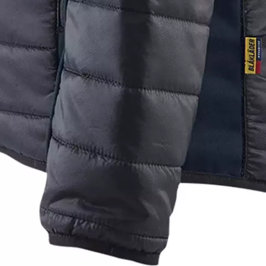 **Elastic Cuffs** gently hug your wrists to keep warmth in and your sleeves right where you want them.