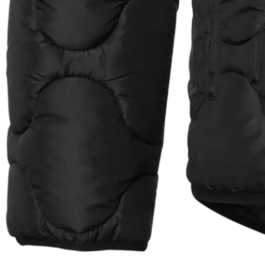 **Elastic Cuffs** seal in warmth while letting you move your arms naturally.