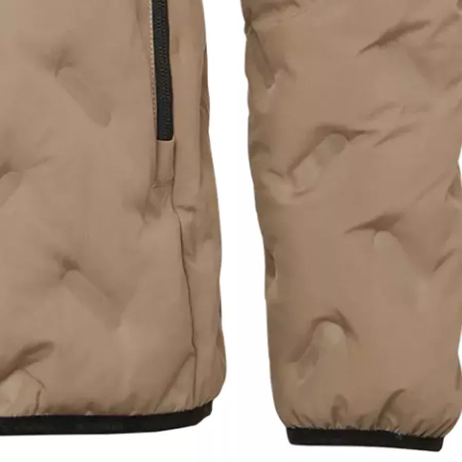 **Elastic Cuffs** create a snug, comfortable seal that helps retain warmth without restricting movement.