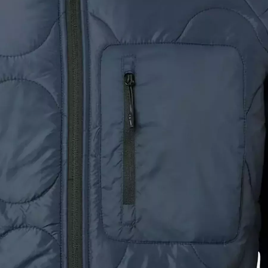 **Chest Pocket** keeps essentials close and easily accessible on the go.