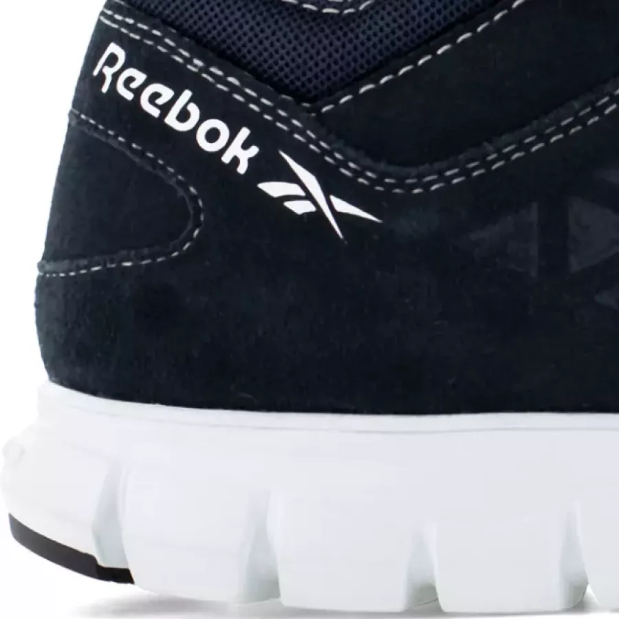 **Atmungsaktives, feuchtigkeitsableitendes Mesh** hält Ihre Füße während langer Schichten kühl und trocken.