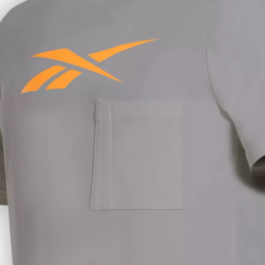 **Chest Pocket** adds practical storage and a functional, casual detail.