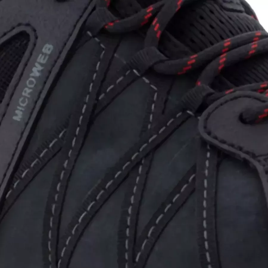 **Atmungsaktives, feuchtigkeitsableitendes Mesh** hält Ihre Füße während langer Schichten kühl und trocken.