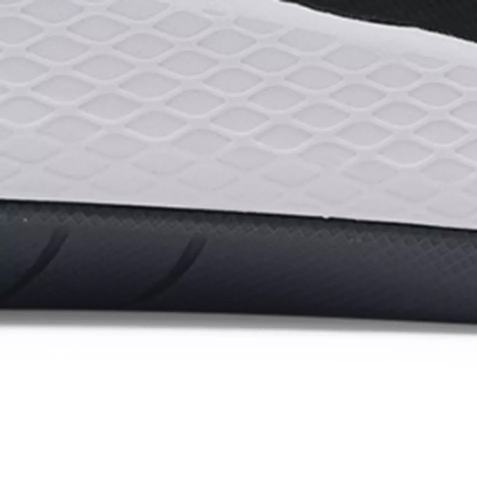 **Durable rubber outsole.** Thick rubber rand wraps the base to protect the midsole and extend wear through long shifts on hard floors.