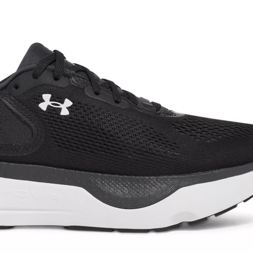 **Supportive lace-up upper.** Engineered knit mesh with structured overlays wraps the foot securely for all-day stability during long shifts.