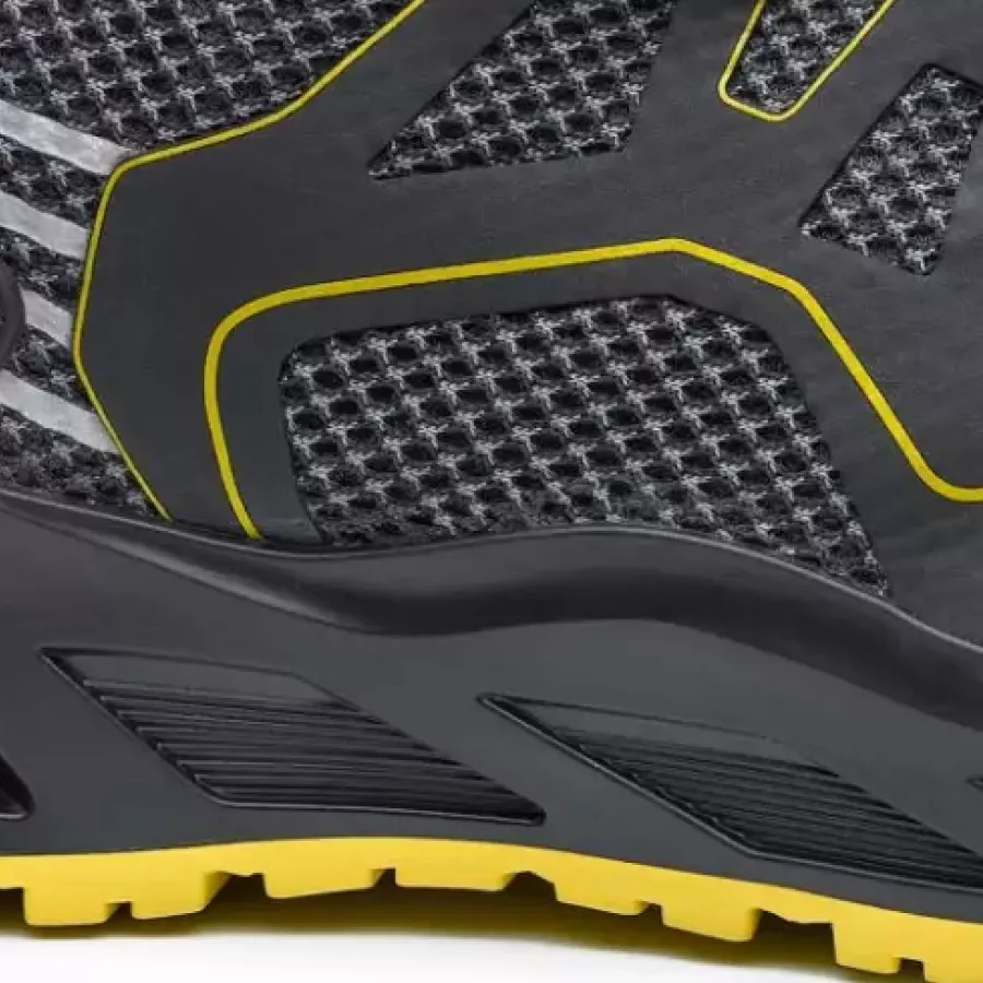 **Slip Resistant Outsole** improves grip and stability so you can move with confidence on varied surfaces.