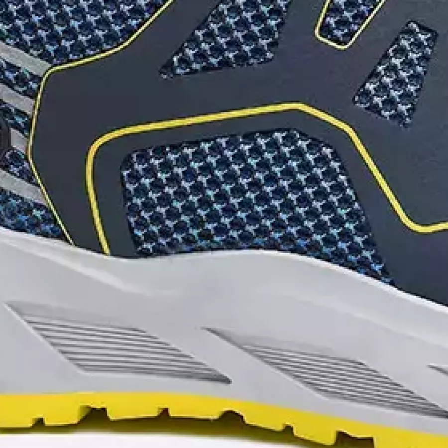 **Slip Resistant Outsole** improves grip and stability so you can move with confidence on varied surfaces.