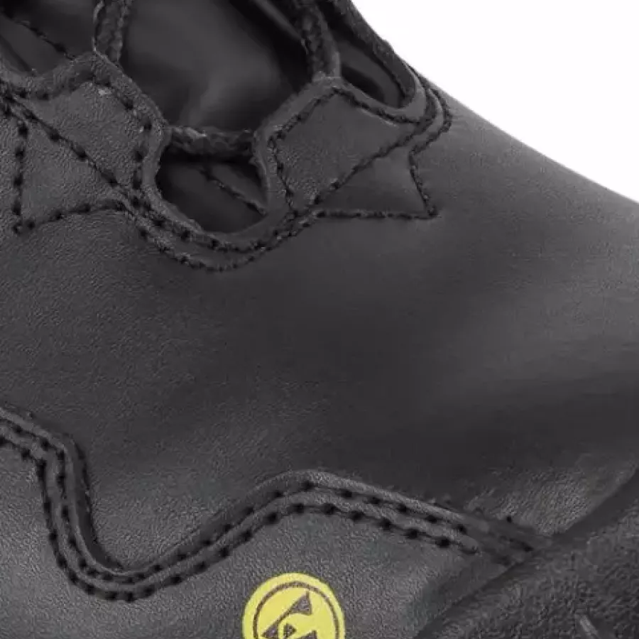 **Wasserabweisendes Obermaterial** hält Ihre Füße bei feuchten oder nassen Bedingungen trocken und komfortabel.