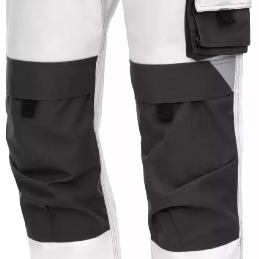 **Knee Protector Pockets** keep your knees cushioned and supported during prolonged kneeling when used with Knee Pads.