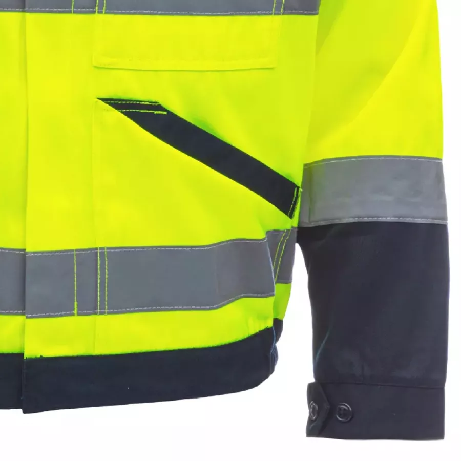 **Verstellbare Bündchen mit Knöpfen** ermöglichen es Ihnen, Ihre Passform für Komfort und Bewegungsfreiheit anzupassen.