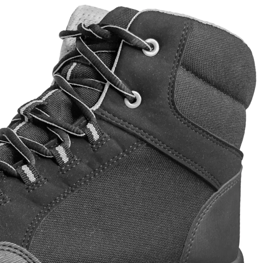 **Gut gepolsterter Schaftbereich** umhüllt Ihre Knöchel mit behaglicher Unterstützung für ganztägige Wärme und Komfort.